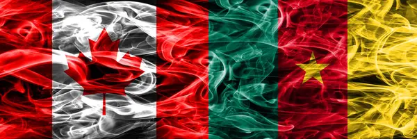 Канада Против Камерунских Дымовых Флагов Размещенных Бок Бок Флаг Канады — стоковое фото