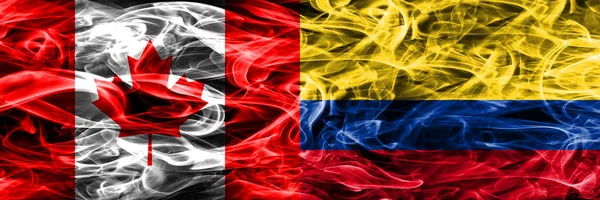 Canadá Colombia Banderas Humo Colocadas Una Lado Otra Bandera Canadá —  Fotos de Stock