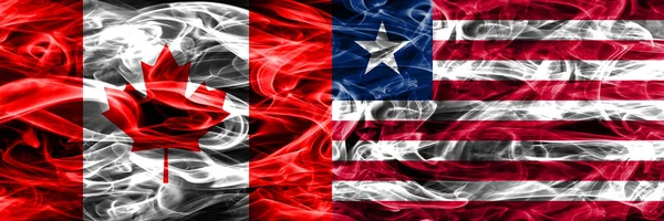 Canada Liberia Smoke Flags Placed Side Side Canadian Liberia Flag — Stock Photo, Image