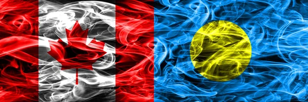 加拿大 帕劳烟旗并排放置 加拿大和帕劳国旗一起 — 图库照片