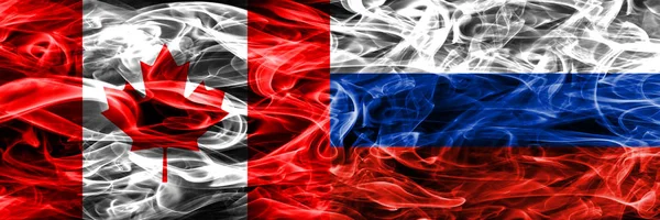 Canadá Rusia Banderas Humo Colocadas Una Lado Otra Bandera Canadá — Foto de Stock