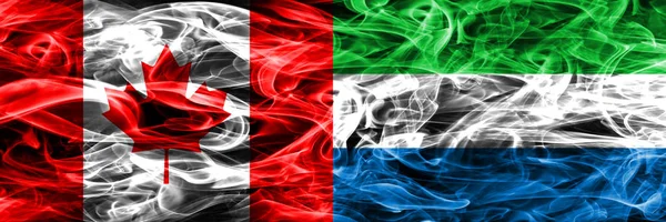 Канада Проти Сьєрра Леоне Дим Прапори Розміщені Поруч Канадська Сьєрра — стокове фото