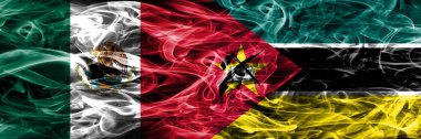Meksika rakip Mozambik duman bayrakları yan yana yerleştirilmiş. Mozambik ve Meksika bayrağı birlikte
