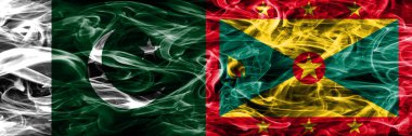 Pakistan vs Grenada duman bayrakları yan yana yerleştirilmiş. Pakistan ve Grenada ipeksi duman bayrakları renkli kalın