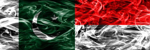 Pakistan Indonesia Smoke Flags Placed Side Side Thick Colored Silky — Stock Photo, Image