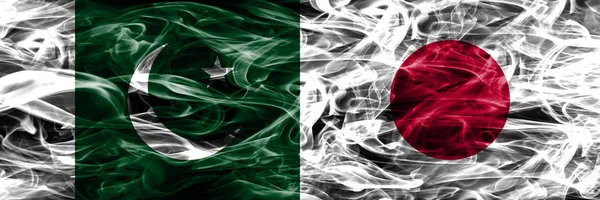 Pakistan Japan Smoke Flags Nebeneinander Platziert Dicke Seidige Rauchfahnen Von — Stockfoto