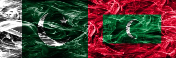Pakistan Maldives Smoke Flags Placed Side Side Thick Colored Silky — Stock Photo, Image