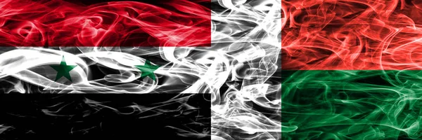 Syrien Gegen Madagaskar Rauchfahnen Nebeneinander Platziert Dicke Seidige Rauchfahnen Aus — Stockfoto