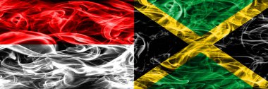 Endonezya rakip Jamaika duman bayrakları yan yana yerleştirilmiş. Endonezya dili ve Jamaika ipeksi duman bayrakları renkli kalın