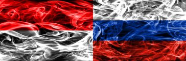 Endonezya rakip Rusya duman bayrakları yan yana yerleştirilmiş. Endonezya dili ve Rusya ipeksi duman bayrakları renkli kalın