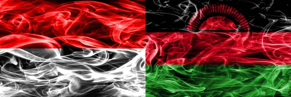 Indonesia Malawi Bandiere Fumogene Affiancate Bandiere Fumo Seta Colorate Spesse — Foto Stock