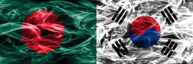 Bangladeş vs Güney Kore duman bayrakları yan yana yerleştirilmiş. Bangladeş ve Güney Kore ipeksi duman bayrakları renkli kalın