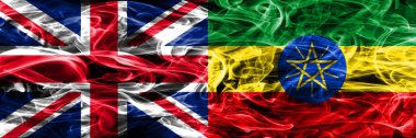 İngiltere vs Etiyopya duman bayrakları yan yana yerleştirilmiş. Büyük Britanya ve Etiyopya ipeksi duman bayrakları renkli kalın