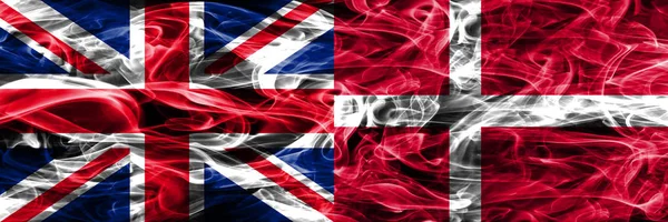 United Kingdom Denmark Smoke Flags Placed Side Side Thick Colored — Stock Photo, Image