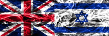 İngiltere vs duman İsrail bayrakları yan yana yerleştirilmiş. İngiltere ve İsrail ipeksi duman bayrakları renkli kalın