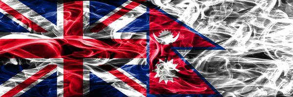 United Kingdom Nepal Smoke Flags Placed Side Side Thick Colored — Stock Photo, Image