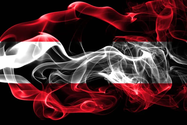 奥地利国旗由黑色背景上的有色烟雾制成 抽象丝质波浪背景 — 图库照片