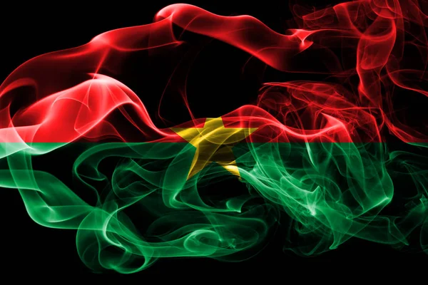 ブルキナファソの国旗は 黒の背景に分離された色の煙から作られました 抽象的な絹のような波の背景 — ストック写真