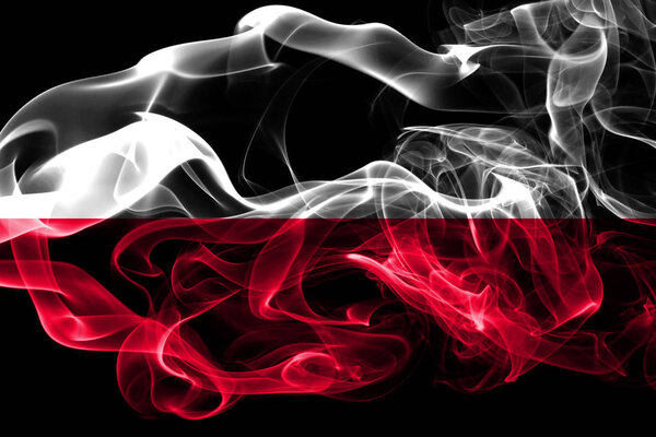National flag of Poland made from colored smoke isolated on black background. Abstract silky wave background.