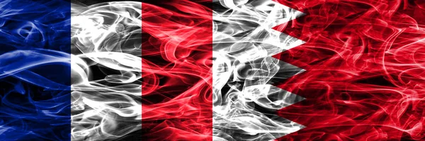 Frankrijk Bahrein Rook Vlaggen Naast Elkaar Geplaatst Dikke Gekleurde Zijdeachtige — Stockfoto