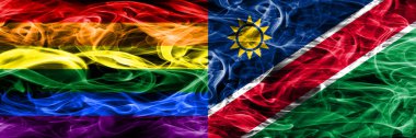 Eşcinsel Rakip Namibya bayrakları yan yana yerleştirilmiş duman. Gay ve Namibya ipeksi duman bayrakları renkli kalın