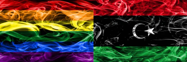 Геи Против Ливии Дымят Флагами Расставленными Рядом Толстые Цветные Шелковистые — стоковое фото