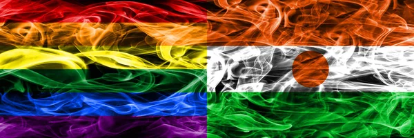 Флаги Гей Против Ниндзя Расставлены Бок Бок Толстые Цветные Шелковистые — стоковое фото