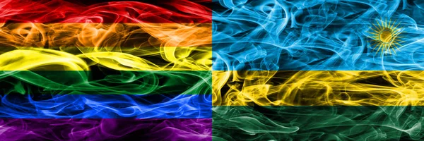 同性恋 卢旺达烟旗并排放置 同性恋和卢旺达的厚颜色的丝绸烟雾旗 — 图库照片