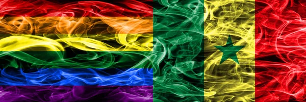 同性恋 塞内加尔的烟雾旗并排放置 同性恋和塞内加尔厚颜色的丝绸烟雾旗 — 图库照片