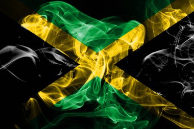 Renkli duman siyah arka plan üzerine izole Jamaika ulusal bayrak imal