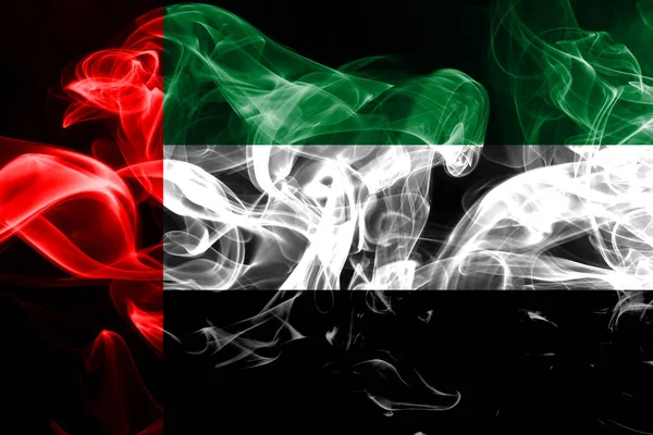 National flag of United Arab Emirates made from colored smoke isolated on black background