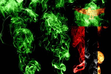 Renkli duman siyah arka plan üzerine izole Zambiya bayrağı yapılmış