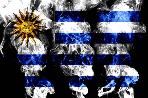 Renkli Duman Siyah Arka Plan Üzerine Izole Uruguay Ulusal Bayrak — Stok fotoğraf