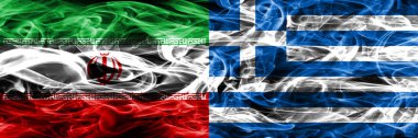 Iran vs Yunanistan duman bayrakları yan yana yerleştirilmiş. İran ve Yunanistan ipeksi duman bayrakları renkli kalın