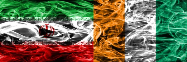 Irán Costa Marfil Banderas Humo Colocadas Lado Lado Banderas Humo —  Fotos de Stock