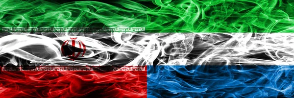 Irán Sierra Leona Banderas Humo Colocadas Lado Lado Banderas Humo — Foto de Stock