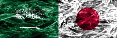 Suudi Arabistan rakip Japonya duman bayrakları yan yana yerleştirilmiş. Suudi Arabistan ve Japonya ipeksi duman bayrakları renkli kalın