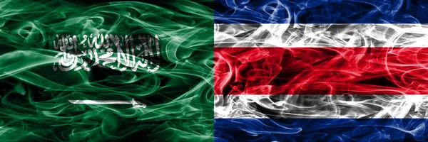 Саудівська Аравія Проти Коста Ріка Дим Прапори Розміщені Поруч Товста — стокове фото