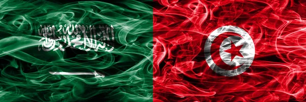 Саудовская Аравия Против Тунисского Дымового Флага Размещенного Бок Бок Толстые — стоковое фото