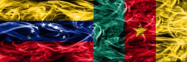Venezuela vs Kamerun renkli kavramı duman bayrakları yan yana yerleştirilmiş