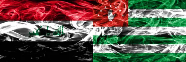 Ιράκ Αμπχαζία Σημαίες Πολύχρωμο Έννοια Καπνού Τοποθετούνται Δίπλα Δίπλα — Φωτογραφία Αρχείου
