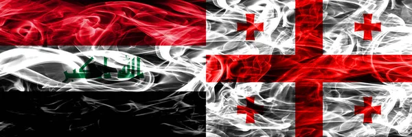 Iraque Geórgia Bandeiras Fumaça Conceito Colorido Colocados Lado Lado — Fotografia de Stock
