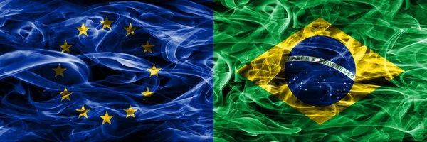 Europe Union and Brazil colorful concept smoke flags placed side by side