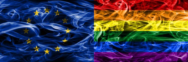 Europe Union and Gay colorful concept smoke flags placed side by side