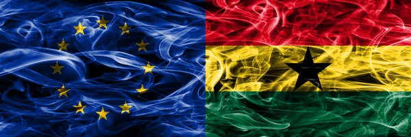 Europe Union and Ghana colorful concept smoke flags placed side by side