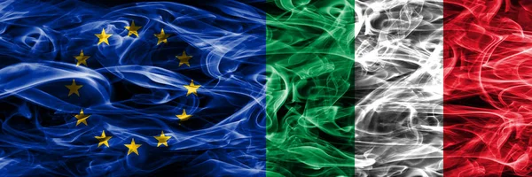 Europe Union and Italy colorful concept smoke flags placed side by side