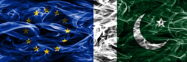 Europe Union and Pakistan colorful concept smoke flags placed side by side