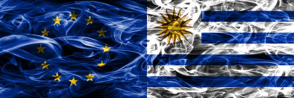 Европейский Союз Уругвай Красочная Концепция Флаги Дыма Помещены Бок Бок — стоковое фото