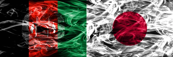 Afeganistão Japão Bandeiras Fumaça Colocadas Lado Lado Bandeiras Fumaça Sedosa — Fotografia de Stock