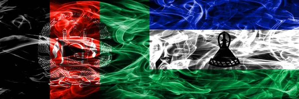 阿富汗 莱索托烟旗并排放置 阿富汗和莱索托厚颜色的丝绸烟雾旗 — 图库照片
